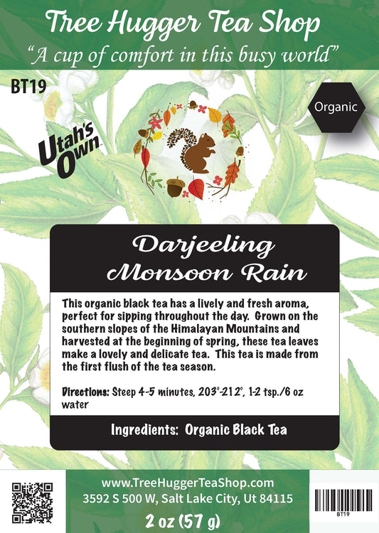 Tea label for Darjeeling Monsoon Rain from Tree Hugger Tea Shop with branding and product details.